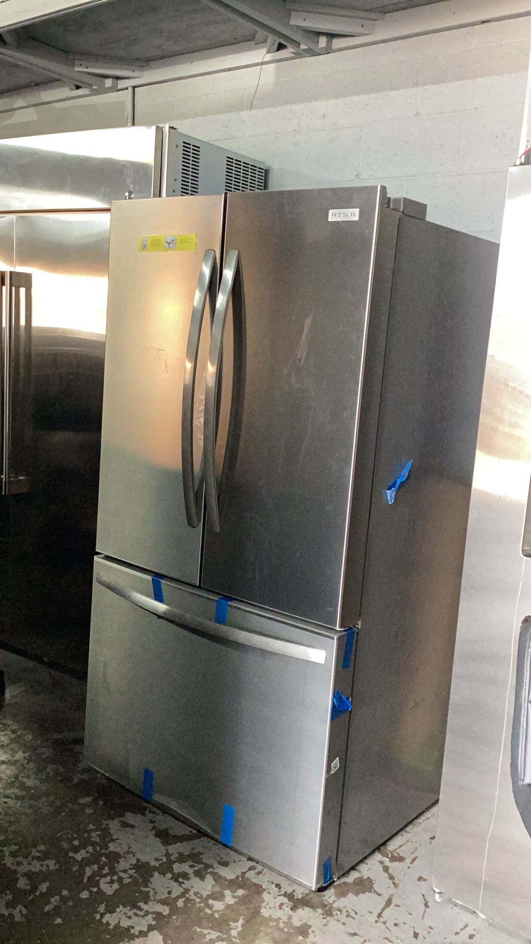 New Frigidaire Refrigerator 28.6 Cu. Ft. French Door Refrigerator with Internal Water Dispenser - Stainless steel