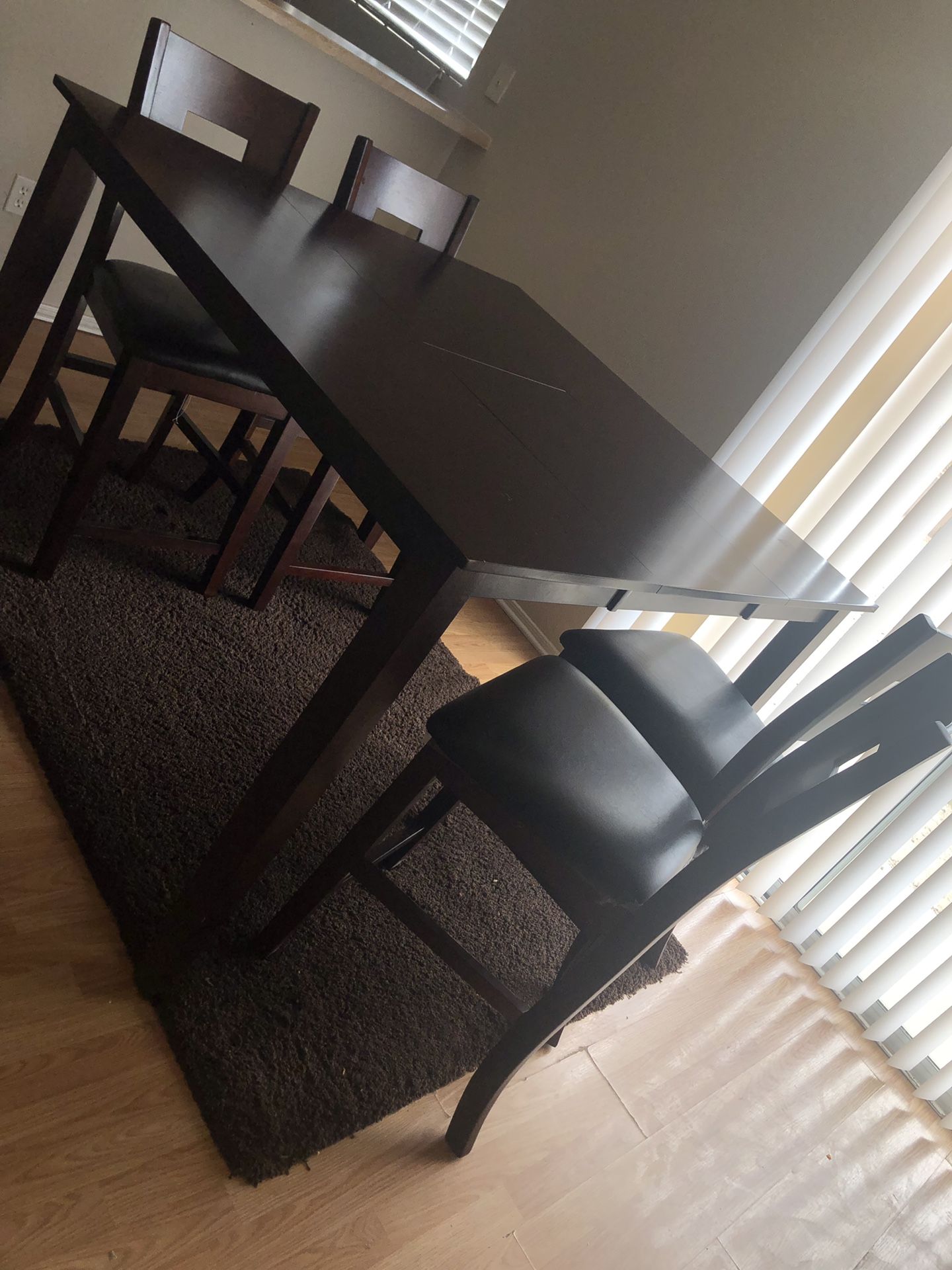 Great condition Ikea Wood table low price needs to go! Additional add on rug will be $50 No low ballers please thanks!