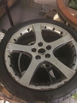 4 - 5 Lug Jaguar 17in Chrome Rims with tires