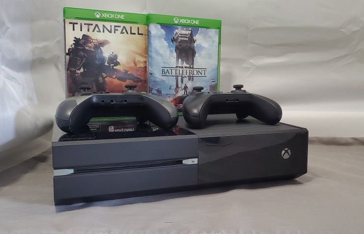 Xbox One Gaming console with controllers, games, and Kinect