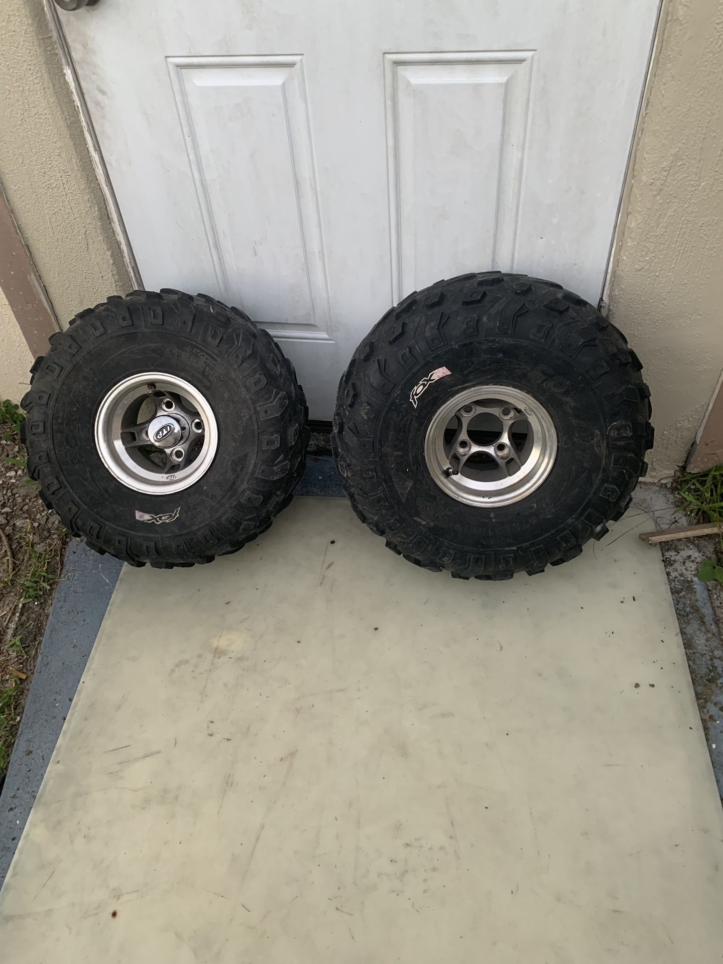 2 atv tires and rims in great condition 40 both