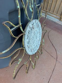 Aztec sun stone wall