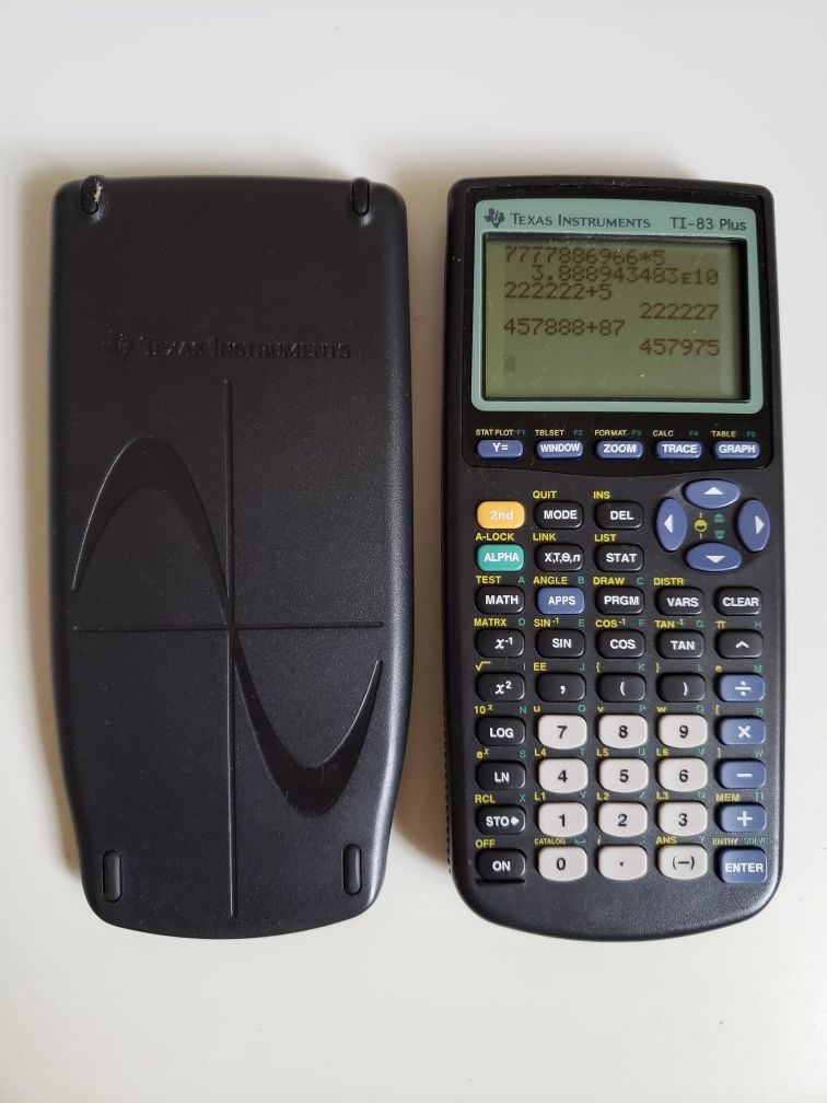 Texas Instruments TI-83 Plus Graphing Calculator With Slice Case.