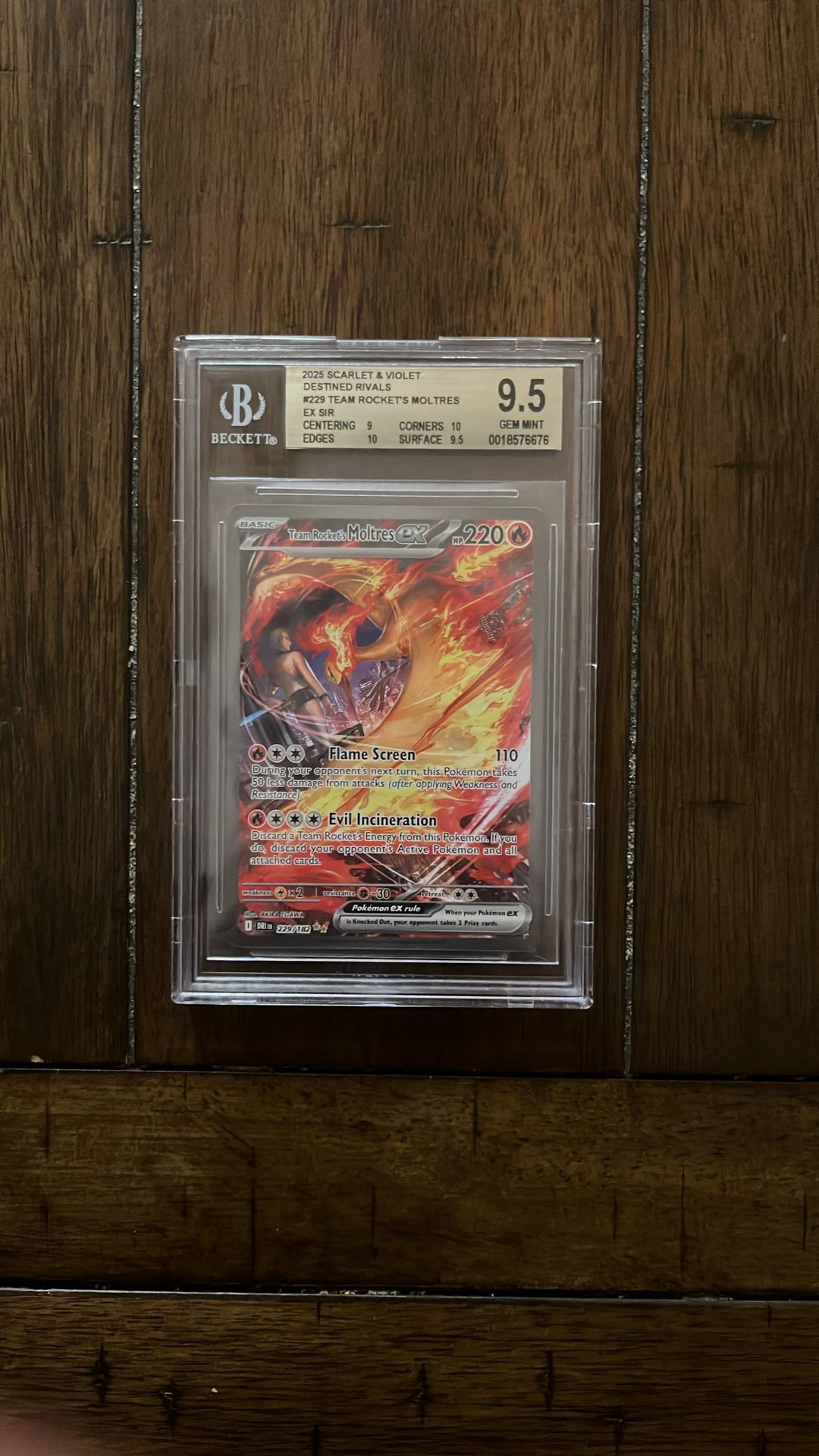 Team Rocket’s Moltres ex SIR from Destined Rivals in a bgs 9.5