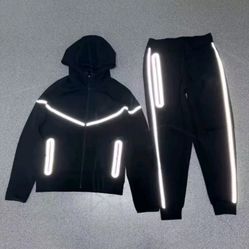 Reflective Black Nike Tech Suit