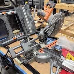 Rigid sliding compound miter saw