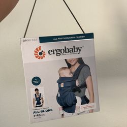 Ergo baby baby carrier.    SEND OFFERS