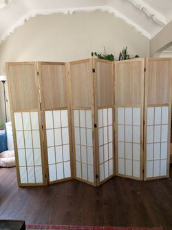 Wood paneled folding partition