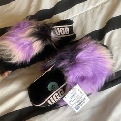 Brand New Never Worn Still Have Tags On It. Ugg  Slip On’s With The Backstrap Size 6.