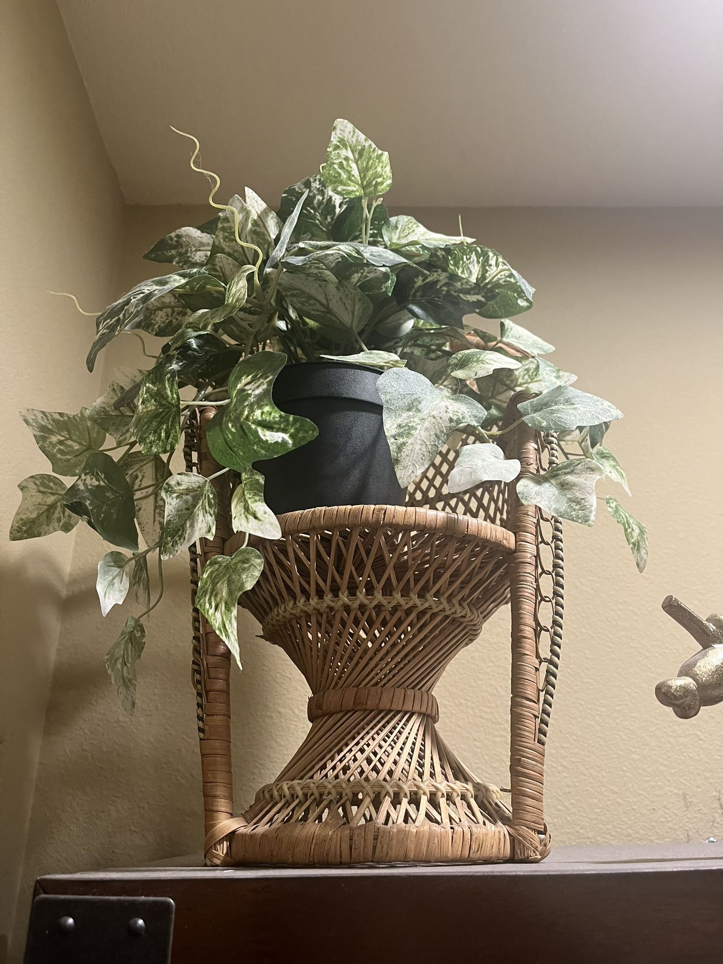 Wicker Stand With Fake Plants