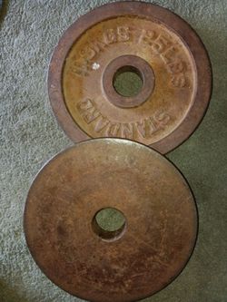 Two 25 pound weight iron standard vintage