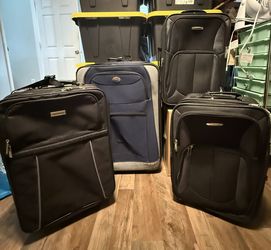 Suitcases - Set Of 4 - All On Rollers