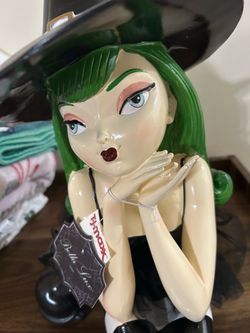 Green witch Halloween sitter decor