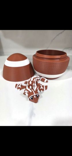 3D Printed Football Dragon Egg with Articulated Dragon