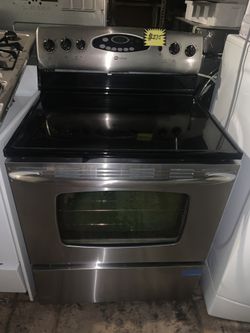 Maytag stainless steel gas range working perfectly with 4 months warranty