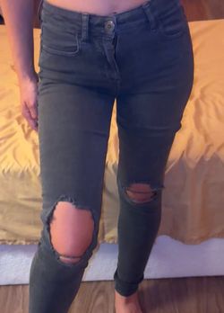 American Eagle Outfitters black skinny jeans with ripped knees