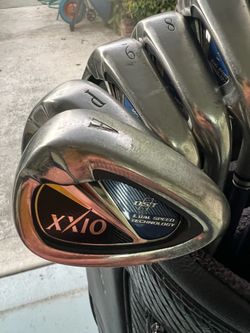 XXIO irons and XXIO bag with wheels