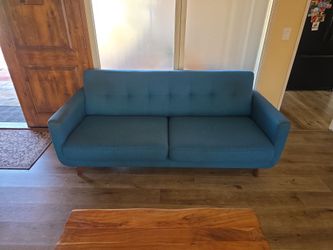 Mid-century modern turquoise couch. 80" long × 34" depth.