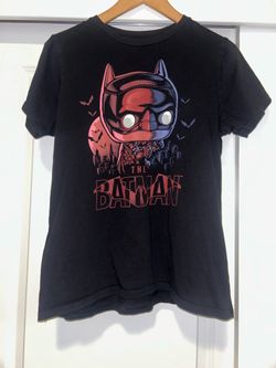 Funko-style Batman graphic.