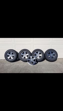 Stock Jeep wheels tires lugs