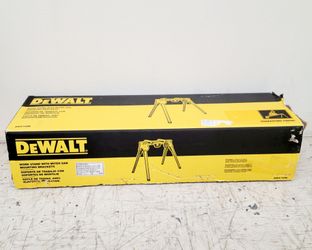 DEWALT DWX725B heavy duty work stand with miter saw mounting brackets. This silver and yellow aluminum stand has a compact folding design for easy tra
