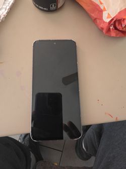 TMOBILE Samsung s24 fe with cracked screen and bottom camara lens in good working condition with Knicks on  each corner