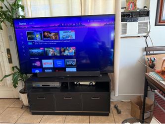 Phillips Tv 75 inches and tv stand