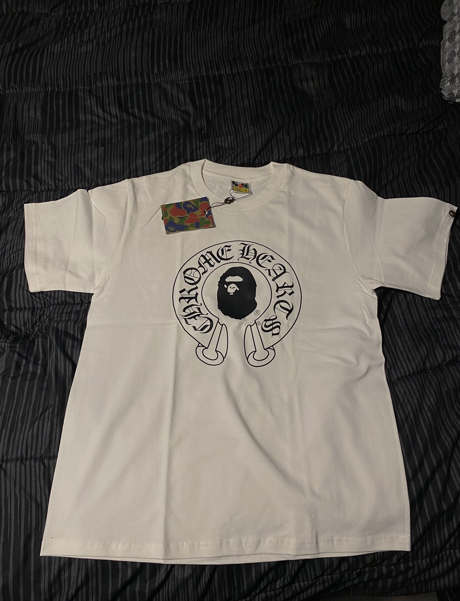 White bape/chrome hearts shirt.