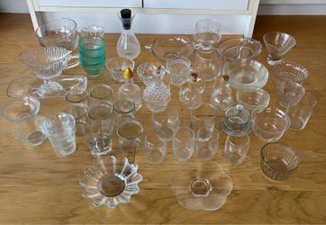 Collection of glasses, oil &vinegar dispensers, plates, bowls, serving dishes, etc. Buy all for $45.
