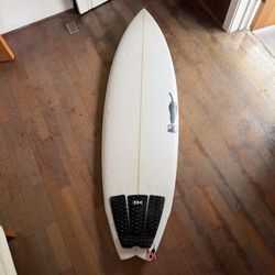 5’7 Chilli black vulture swallow tail surfboard