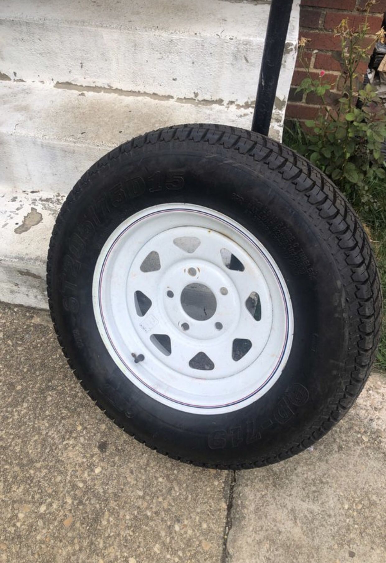 “One” ST205/75D15 Radial Trailer Tire w/ 15" White Spoke Wheel