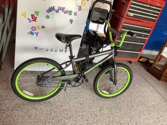 Huffy 20” BMX Rock It like new bicycle, rode 3 months, excellent tires, clean no rust Nothing to do but ride Plainfield, Illinois