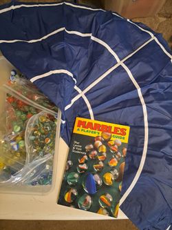 Glass marbles w/ mat and book