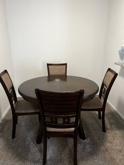 Dark Wood Round Dining Table with 4 Upholstered Chairs