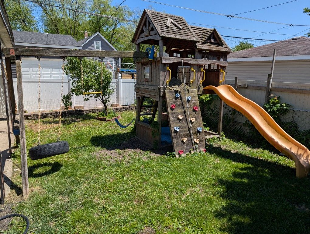 Wooden Player With Swings And Fort