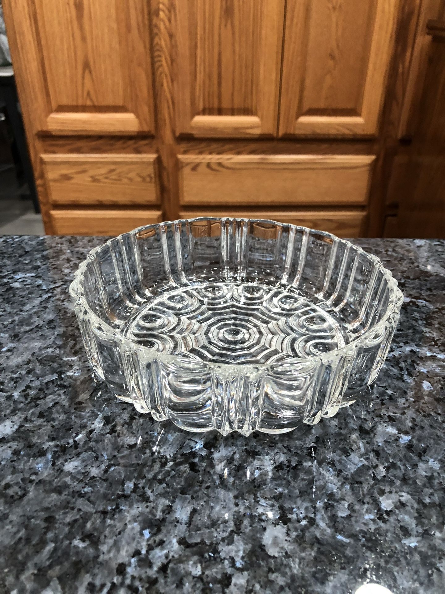 Vintage glass cafe open candy dish. Size 7 inches wide. Preowned very good condition. No brand or markings. Has been on display in a curio cabinet