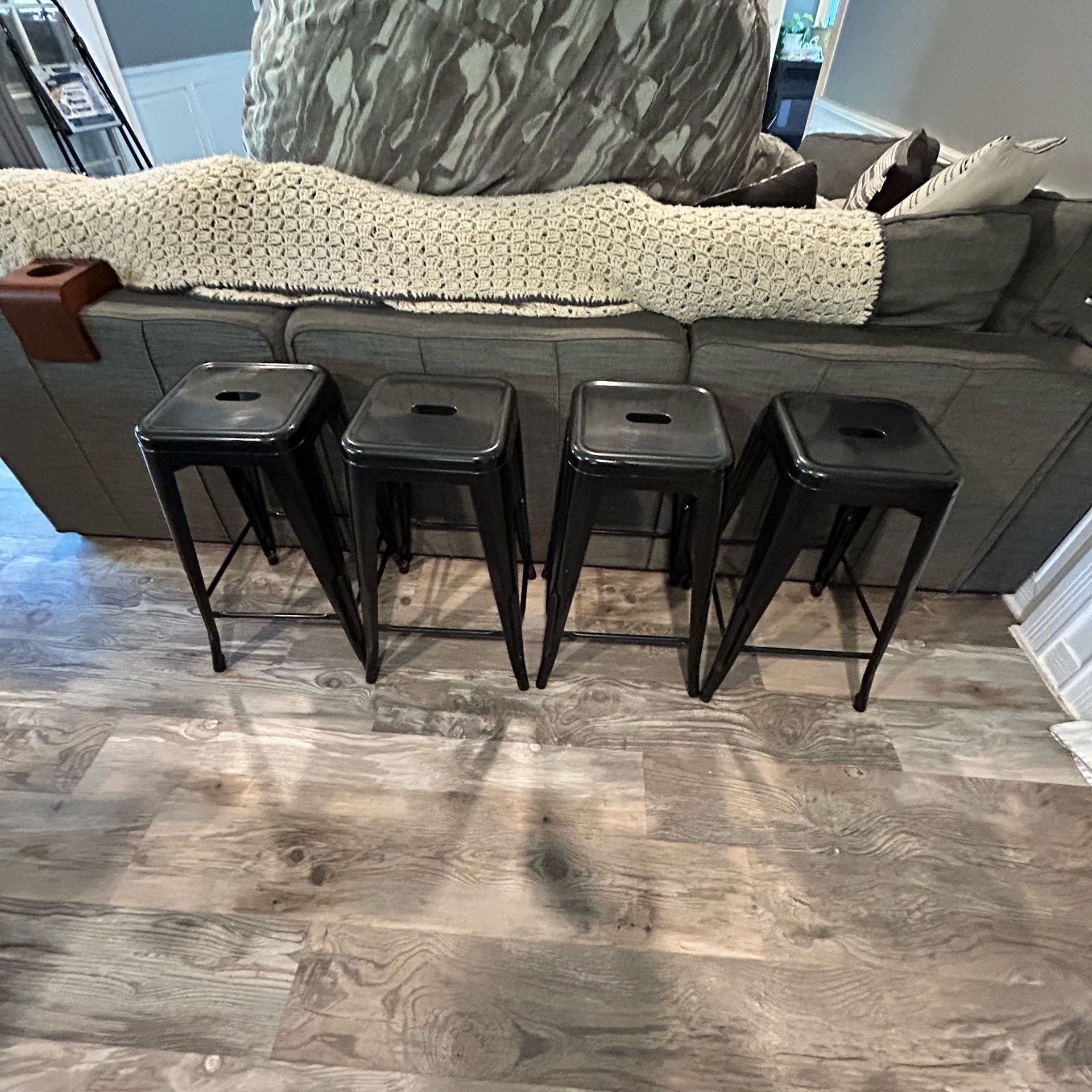 4 black metal barstools