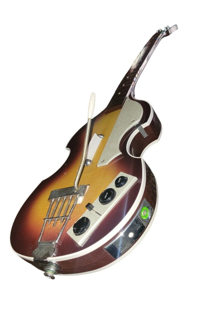 The Beatles Rock Band XBox309 Wireless Hofner Bass Guitar Tested and working All buttons Function
Comes with back piece for battery's
The Beatles Roc