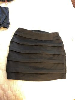 Woman’s black skirt forever 21 size small woman’s stretch fits like medium
