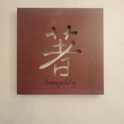  Metal  tranquility sign dark cranberry colored