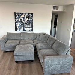 BRAND NEW GREY CORDUROY SECTIONAL SOFA W/ OTTOMAN (NEW IN BOXES)