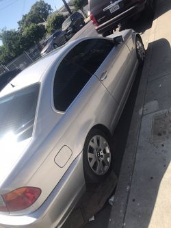 Bmw 2000 cars 4 cylinders 129,000 miles tags expired needs tube up other then that car is percect