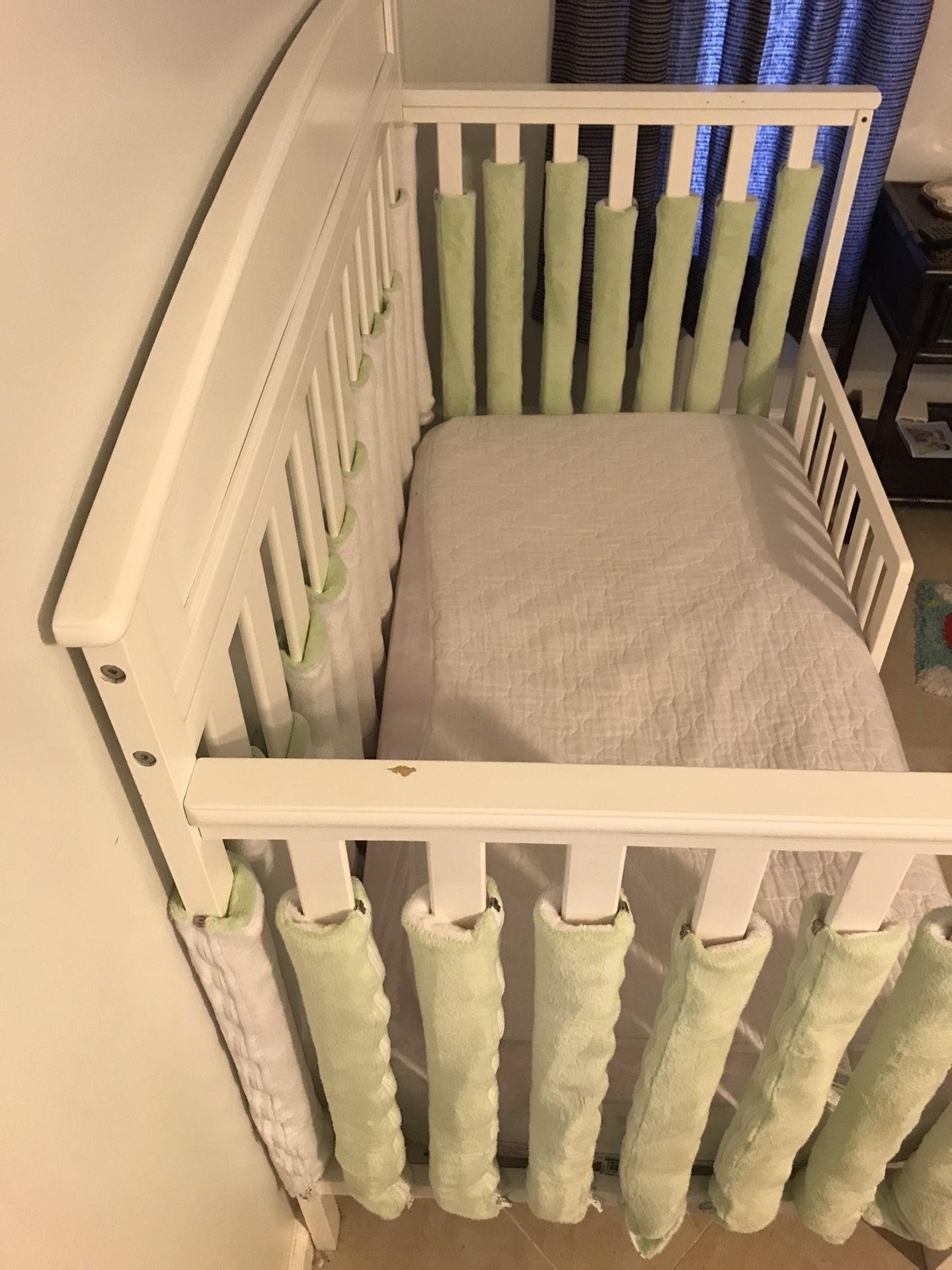 Delta white wood toddler bed (mattress included) which can convert into