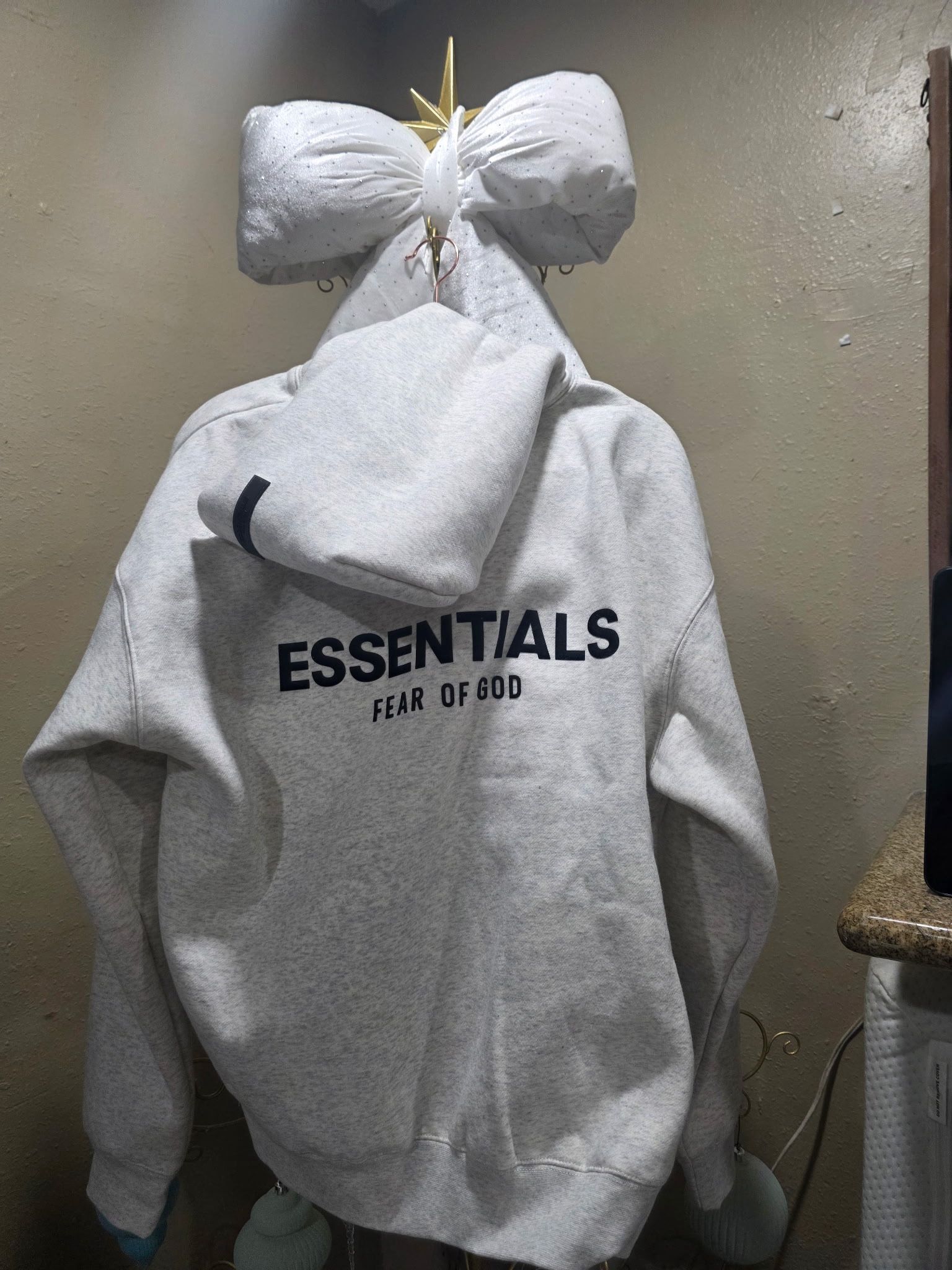Light oat essentials hoodies 