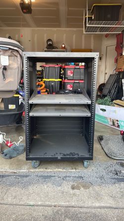 Audio video production rack with shelves