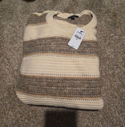 Brand new with original store tags attached (NWT) in the plastic bag! The original price tag shows $128.00.