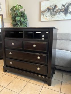 Nothing wrong, Media Chest, solid wood, all the drawers works perfectly, sturdy/string.