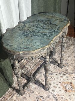 Wurlitzer ornate vintage console table.
