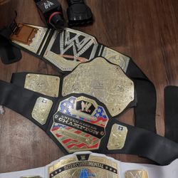 Wwe Belts, Microphone And Roman Reigns Sleeve