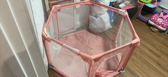 Pink baby playpen
